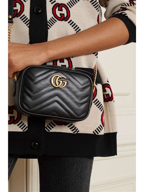 GUCCI GG Marmont Camera mini quilted leather shoulder bag .